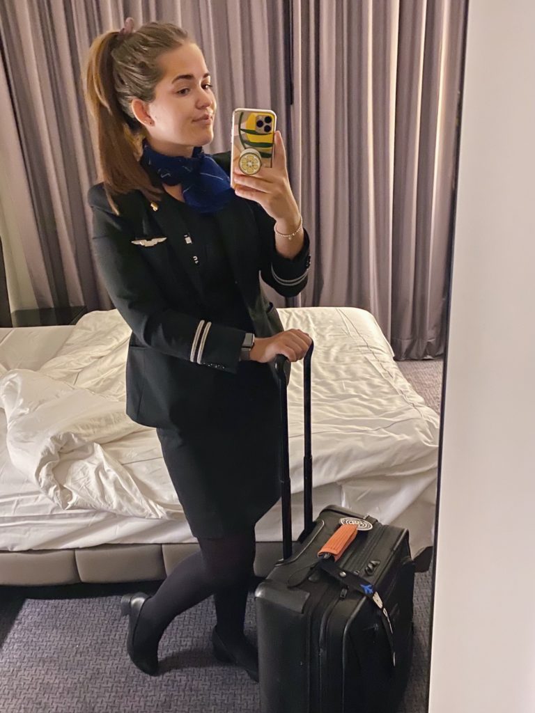 things flight attendants wish passengers knew: niki in nuremberg in her flight attendant uniform