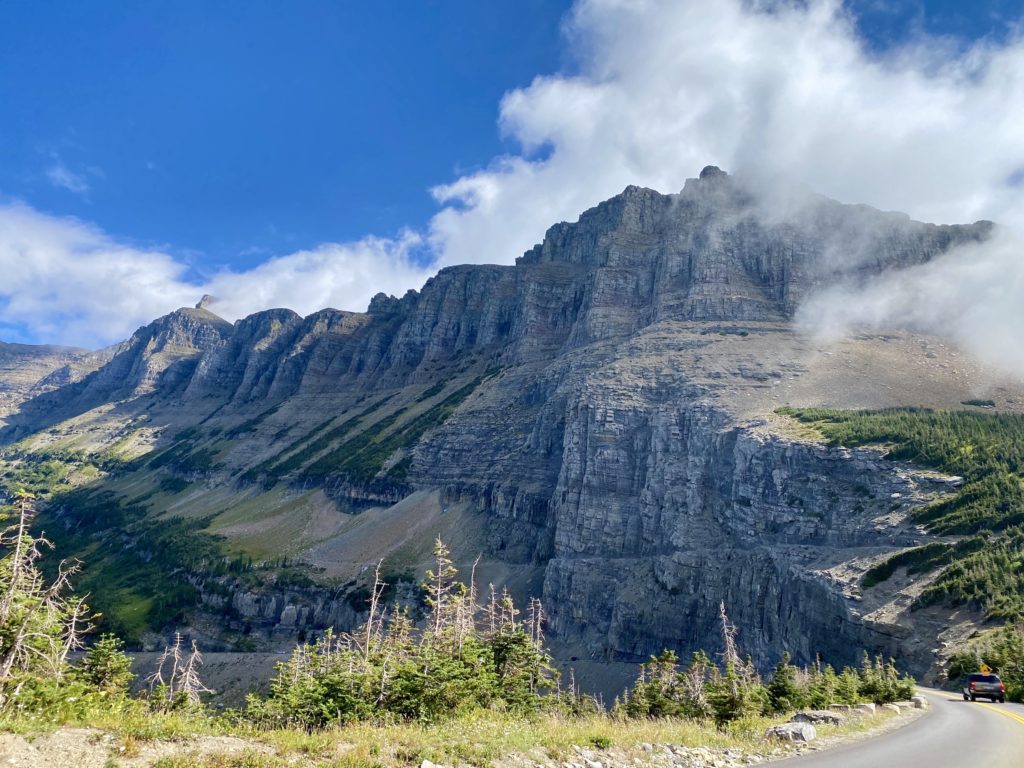 glacier national park itinerary: mountains from going-to-the-sun road