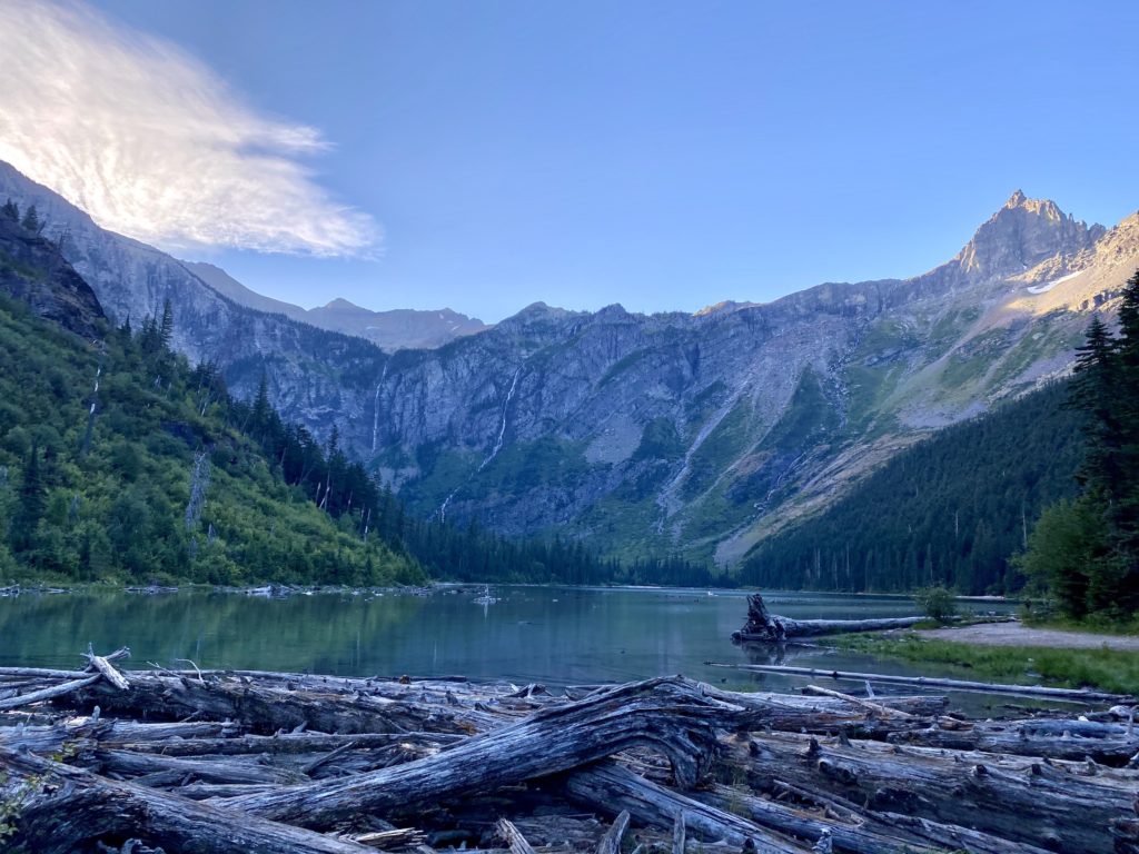 glacier national park itinerary: early morning lake and mountains