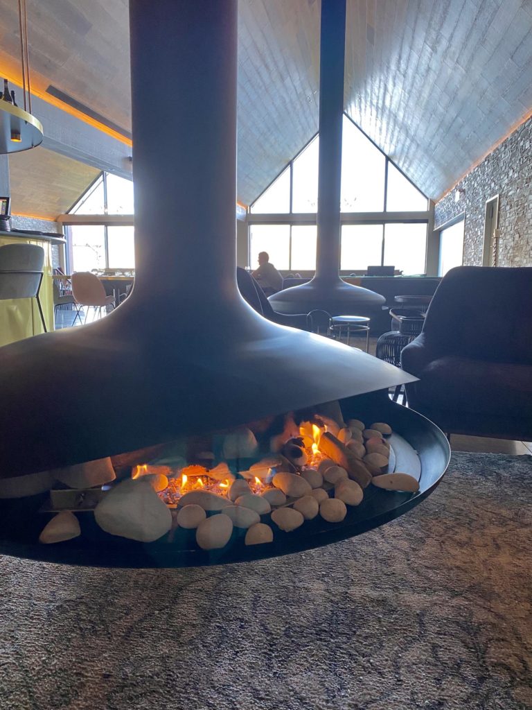 luxury spa getaway queenstown: nest restaurant at kamana lakehouse floating fireplace