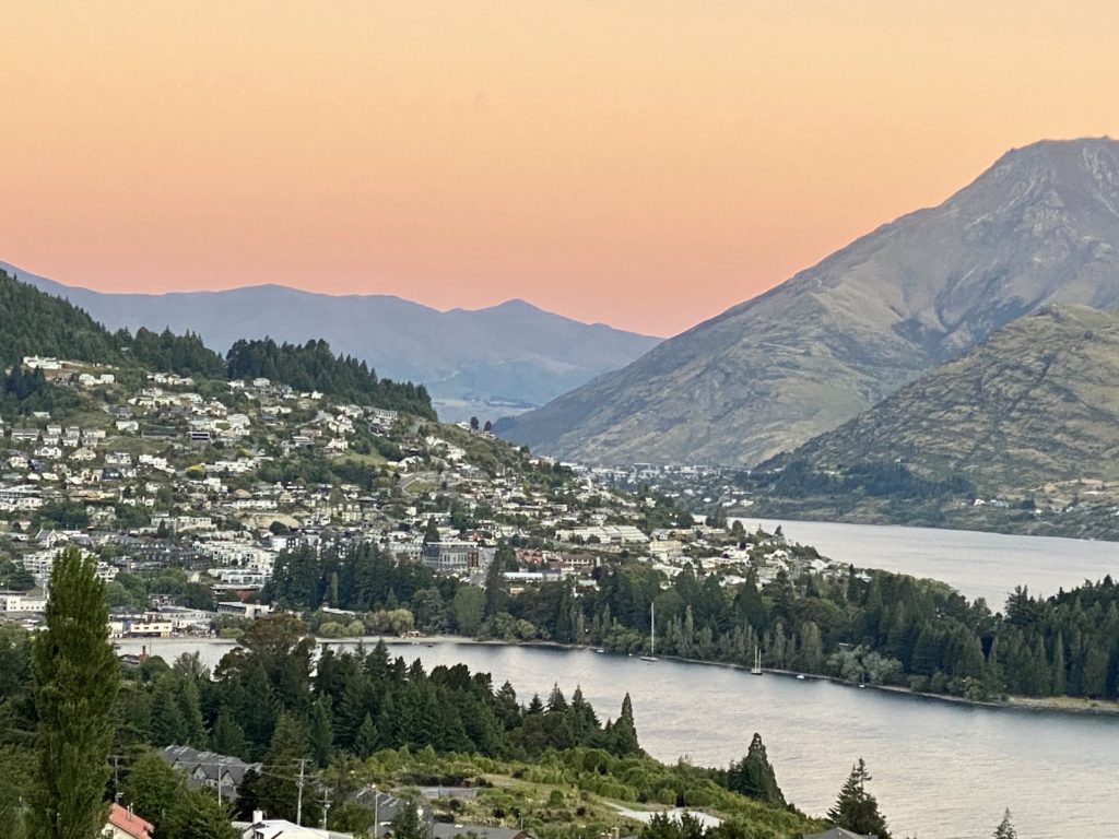 view of queenstown at golden hour sunset