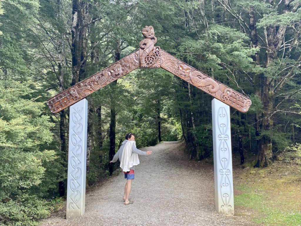 ben underneath the riwaka resurgence entrance arch