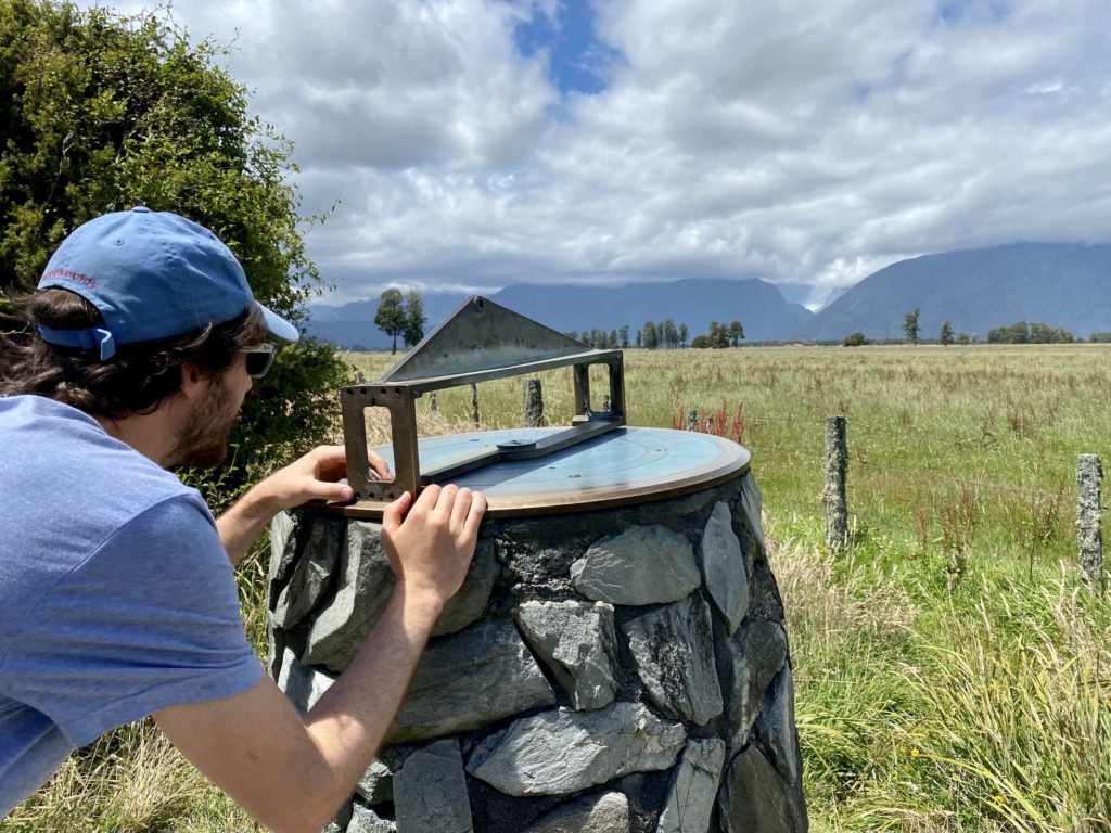 west coast day 6: ben looks at fox glacier from a distance