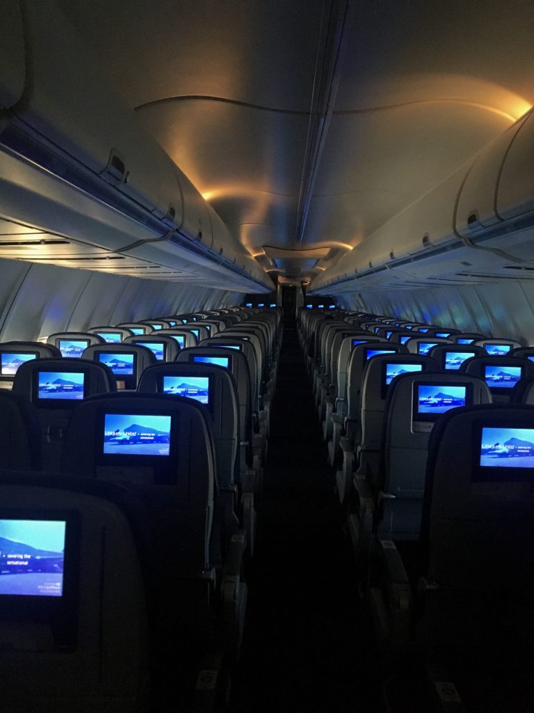 economy cabin of an airplane at night