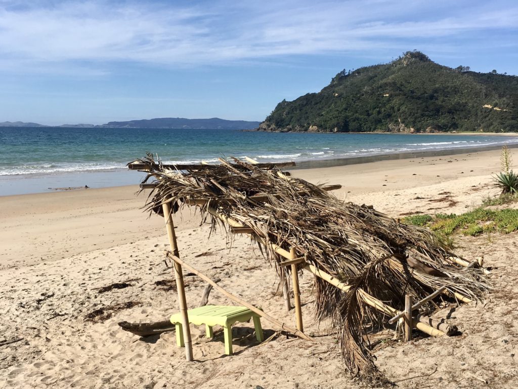beach with a bamboo structure