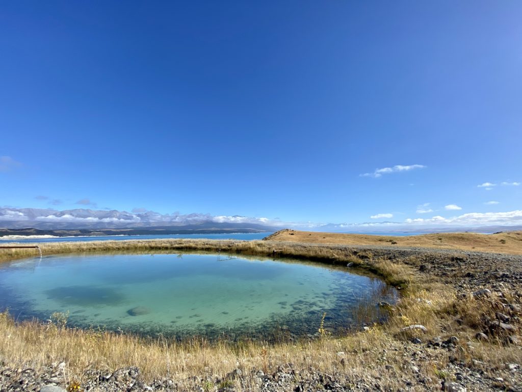 pukaki kettle hole: little pond overlooking lake pukaki