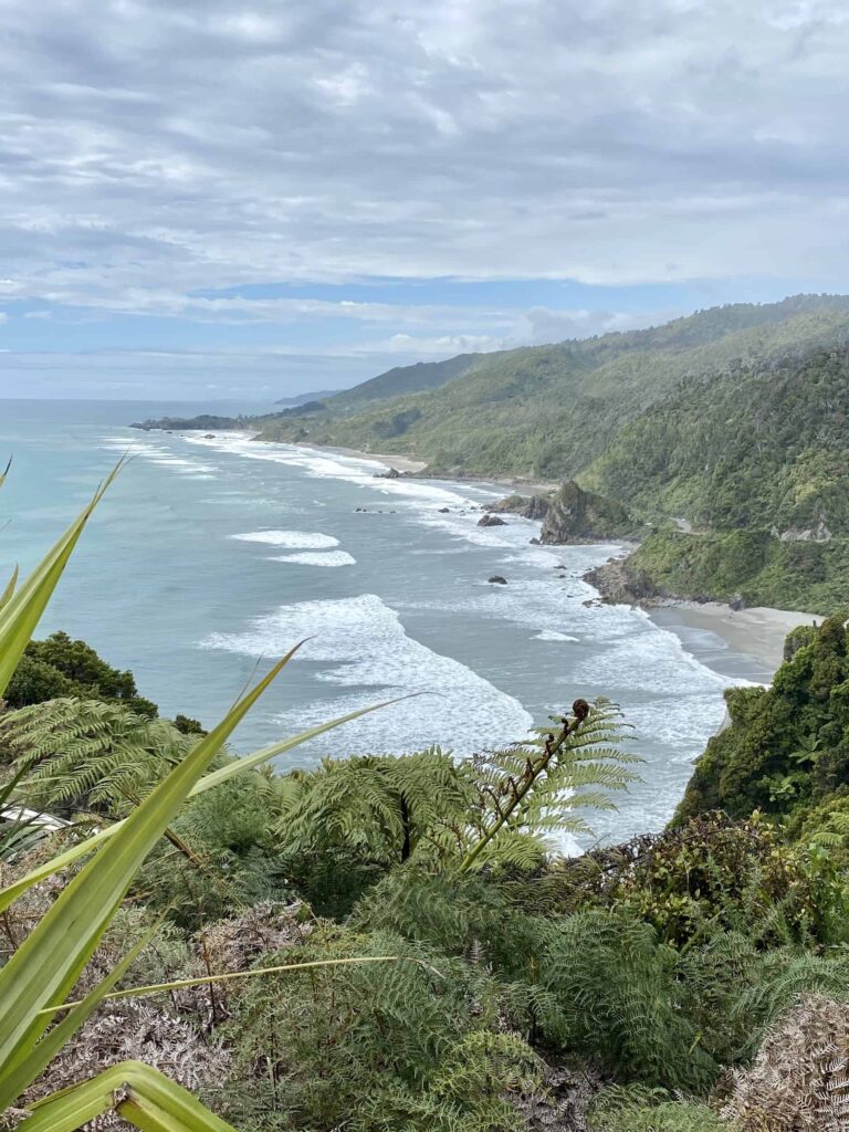 West Coast New Zealand itinerary: view of cliffs, beaches, and waves
