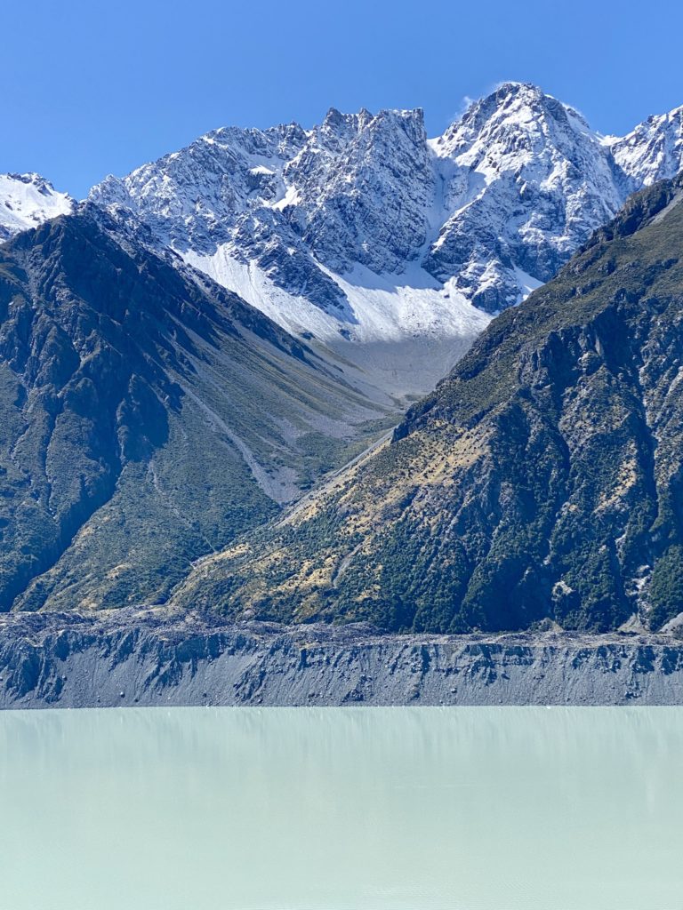 blue lakes and tasman glacier: top of a mountain with snow