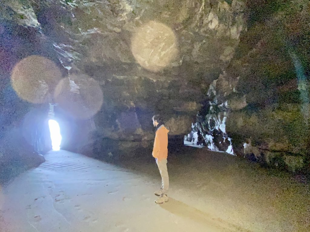 Ben stands inside Cathedral Caves