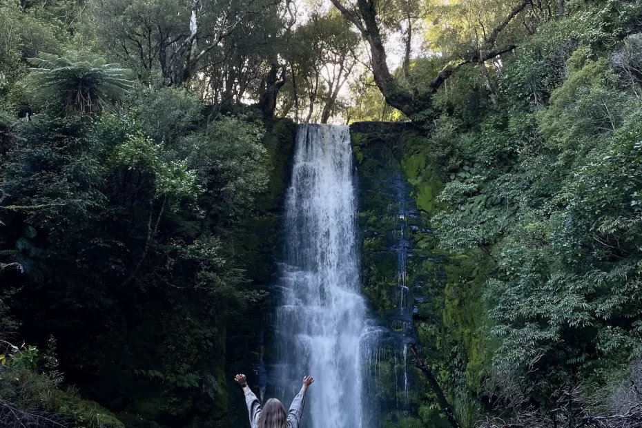 Niki stands in front of one of the best waterfalls in the Catlins