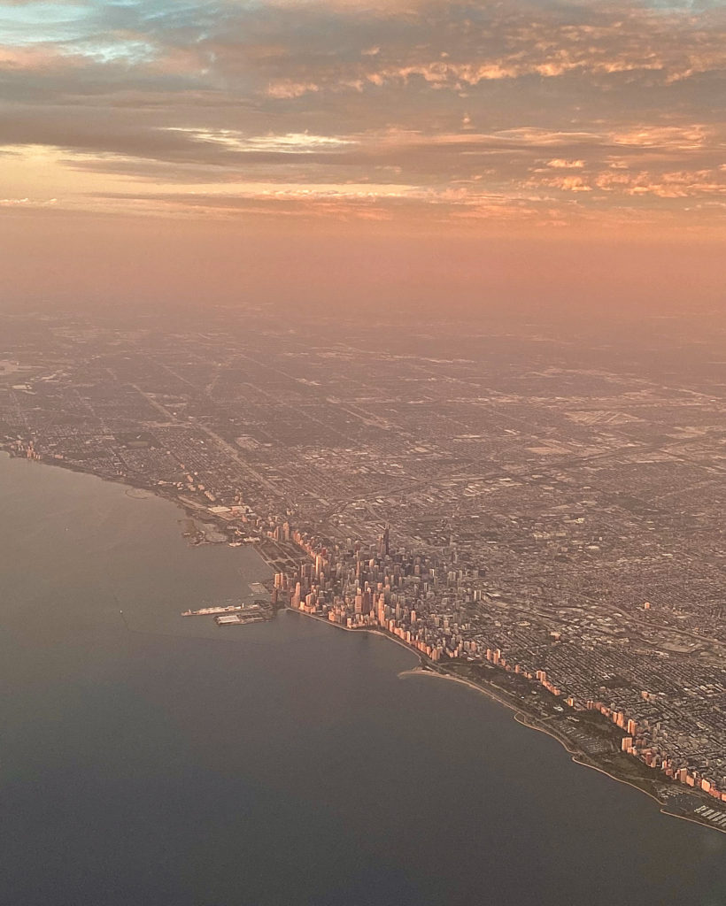 How to plan a trip: Chicago skyline and Lake Michigan at sunrise from above