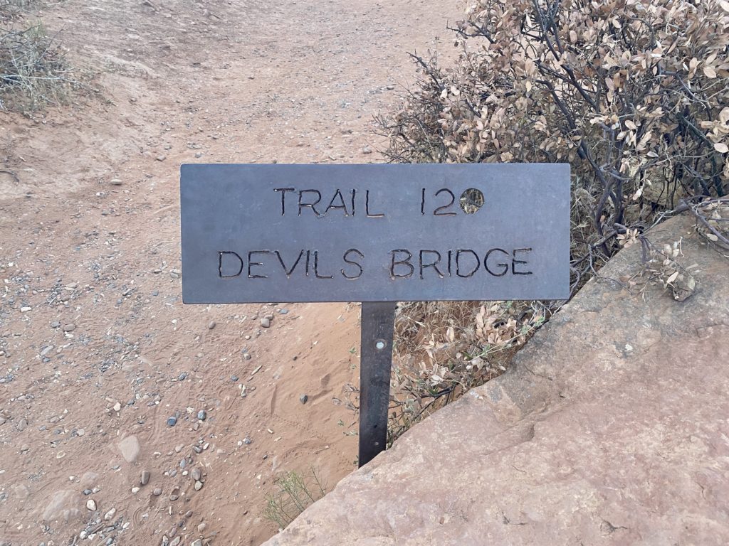 Hiking sign that says Trail 120 Devil's Bridge