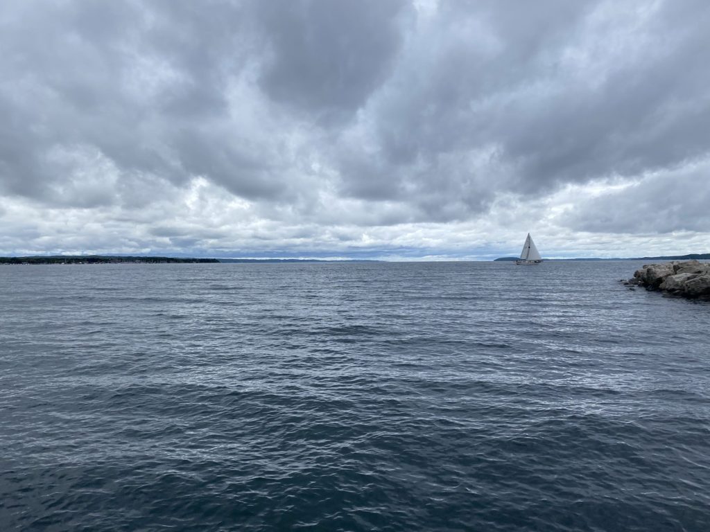 Lake Michigan Circle: lake and sailboat from the Leelanau Peninsula, Michigan