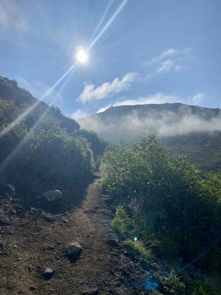 Fog and sunshine on the path to Flattop Mountain