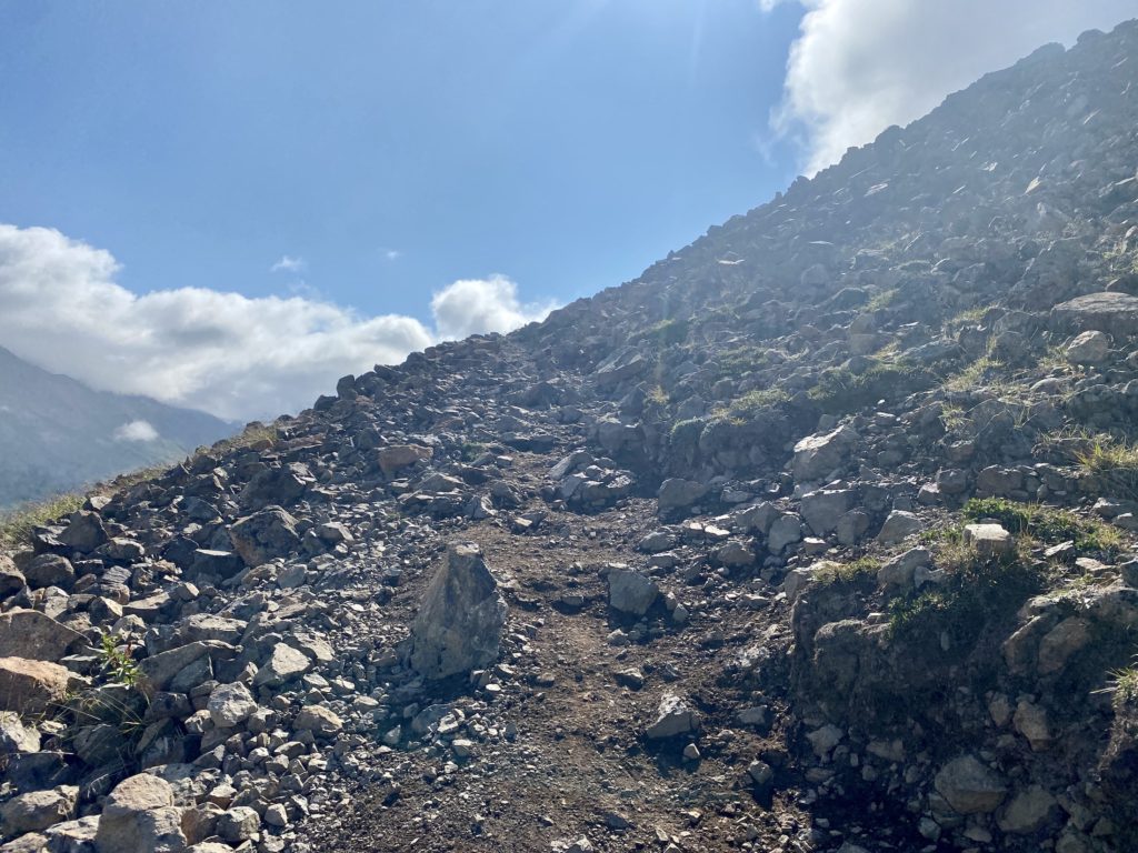 Rocky path up to Flattop Mountain peak
