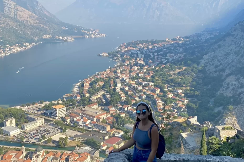 Niki stands on the Kotor Walls, Kotor, Montenegro
