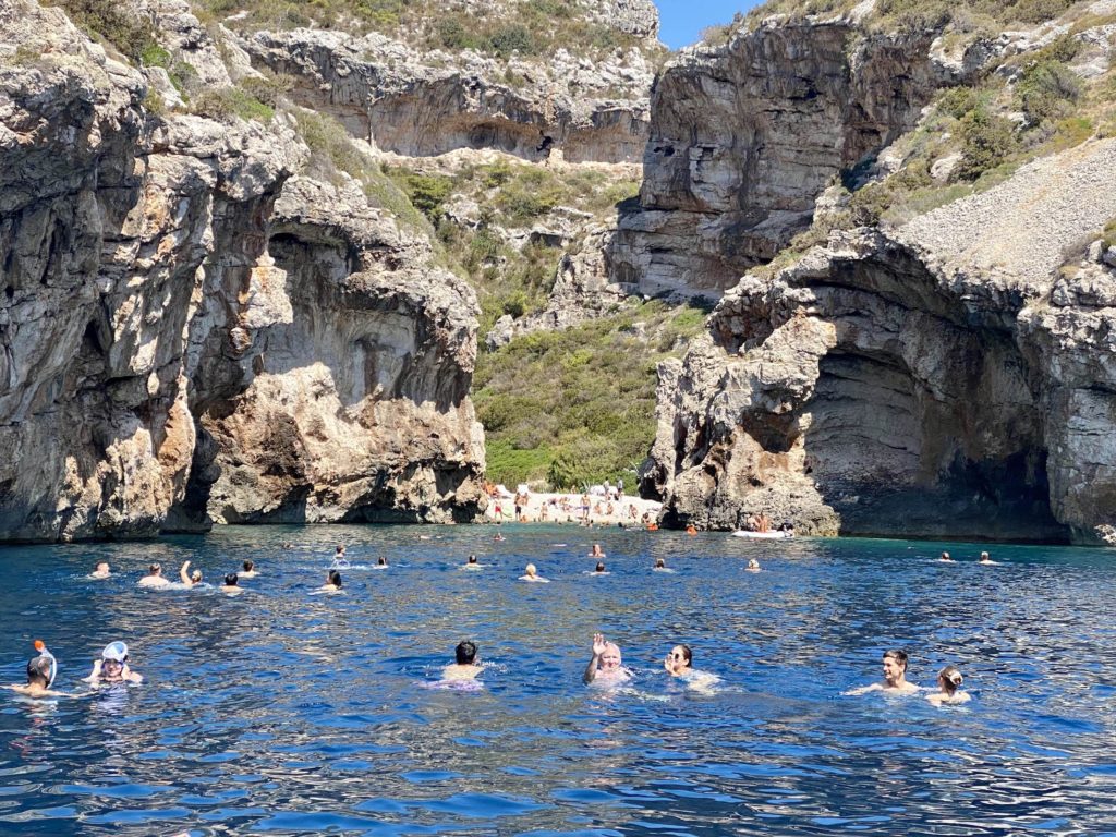 Swimmers near Stiniva Beach, Vis Island, Croatia