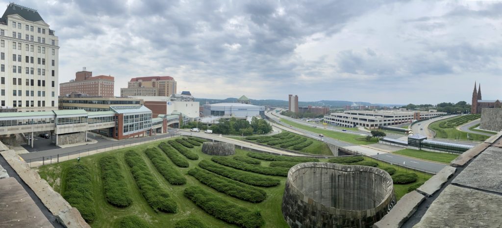 View of grass and buildings from The Egg Performing Arts Center
