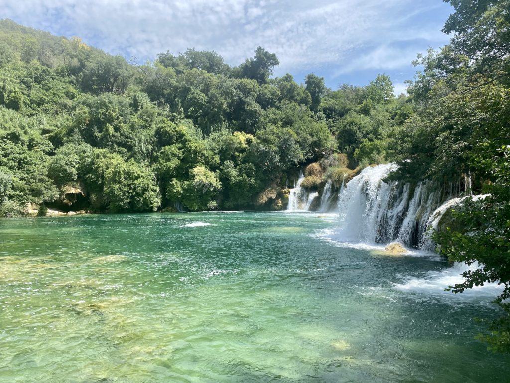 Waterfalls, trees, and lake at Krka National Park, Croatia