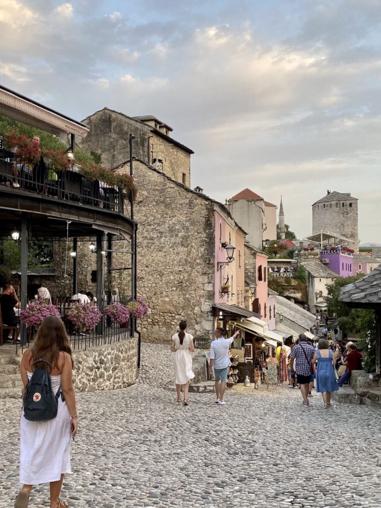Niki walks down the street in Old Town Mostar, Bosnia & Herzegovina