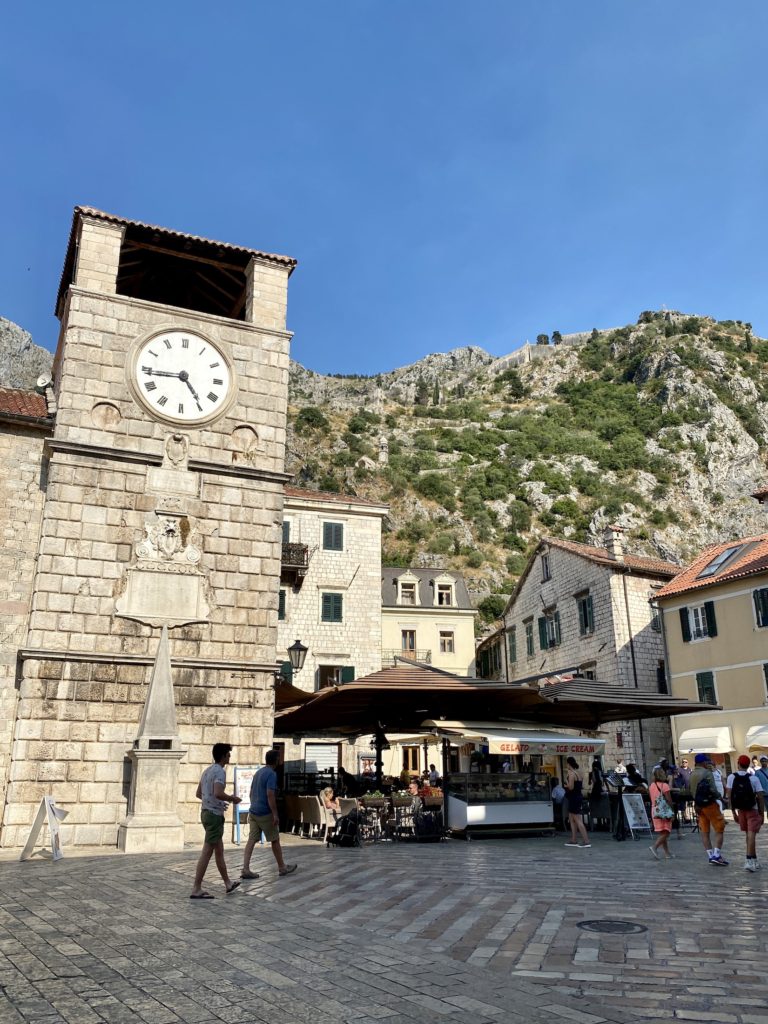 Kotor Old Town: clock tower and mountains