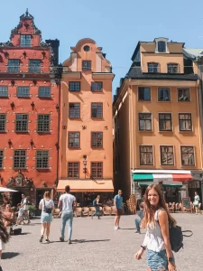 One day in Stockholm, Sweden: Niki stands in Gamla Stan (Old Town)