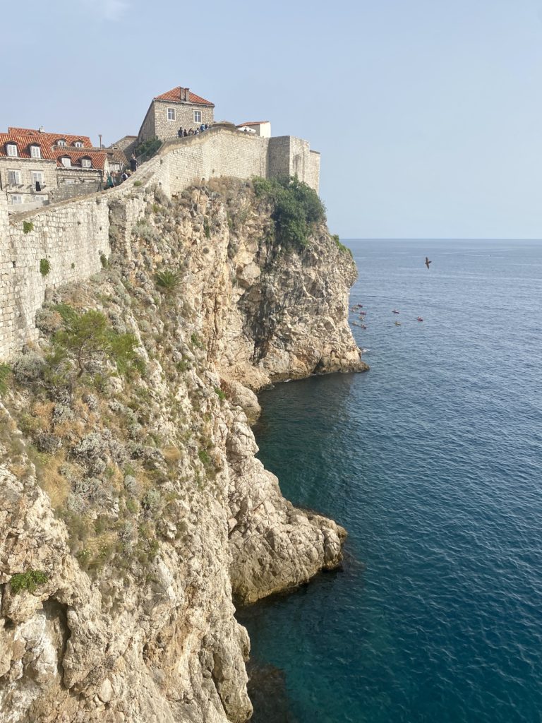 Dubrovnik travel guide: Old Town city walls, cliffs, and ocean in Dubrovnik, Croatia