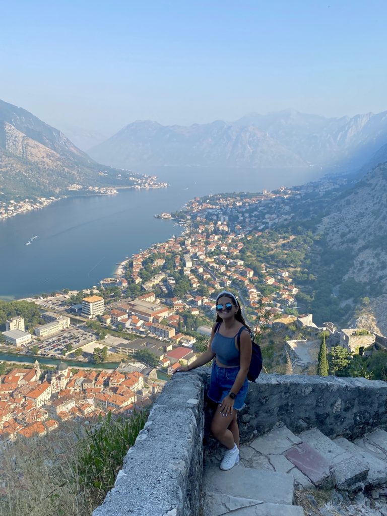 One Second Everyday in 2021: Niki stands on the city walls with a view of Kotor, Montenegro in the background