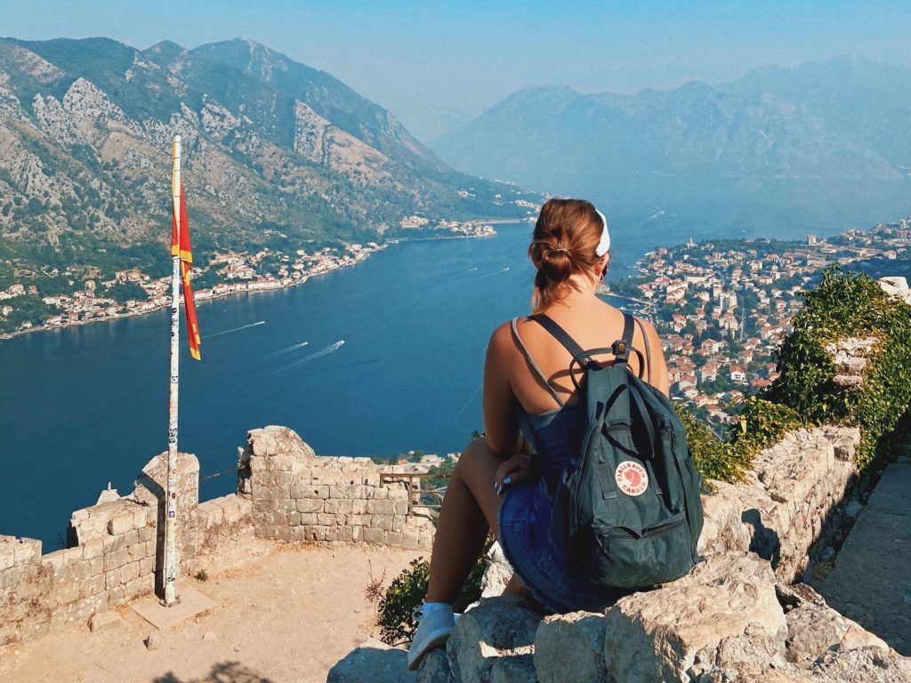 One Second Everyday in 2021: Niki sits on the top of the Old City Walls in Kotor, Montenegro