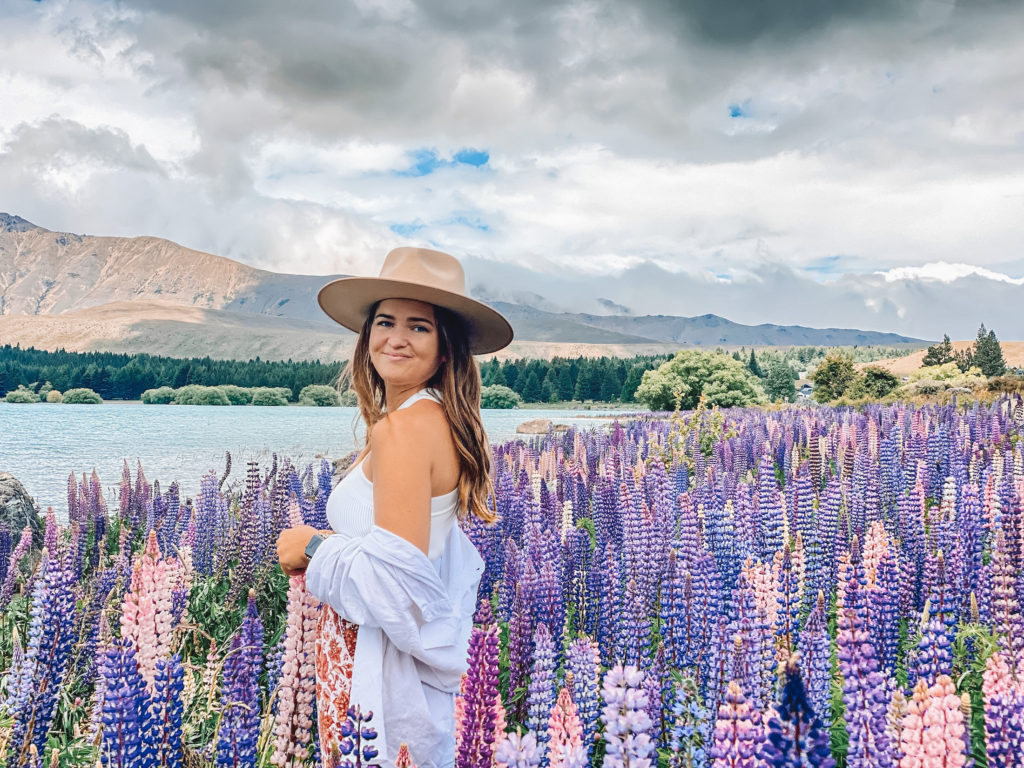 One Second Everyday in 2021: Niki stands in a field of lupins, Tekapo, New Zealand