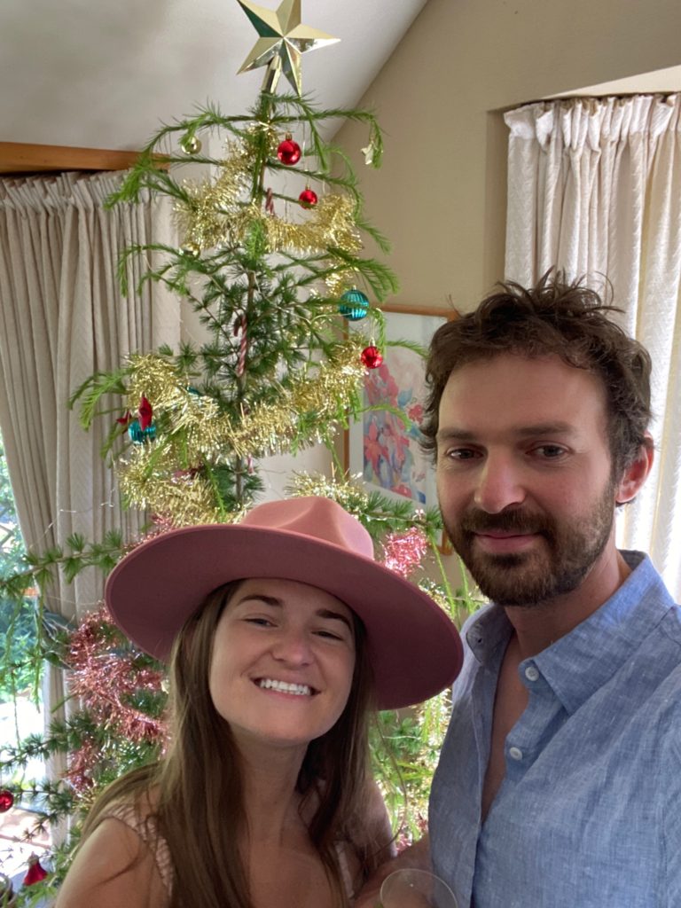 One Second Everyday in 2021: Niki and Ben pose in front of the Christmas tree