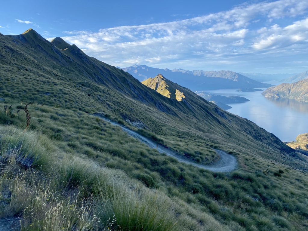Curvy trail from halfway up Roys Peak at sunset, Wanaka, New Zealand