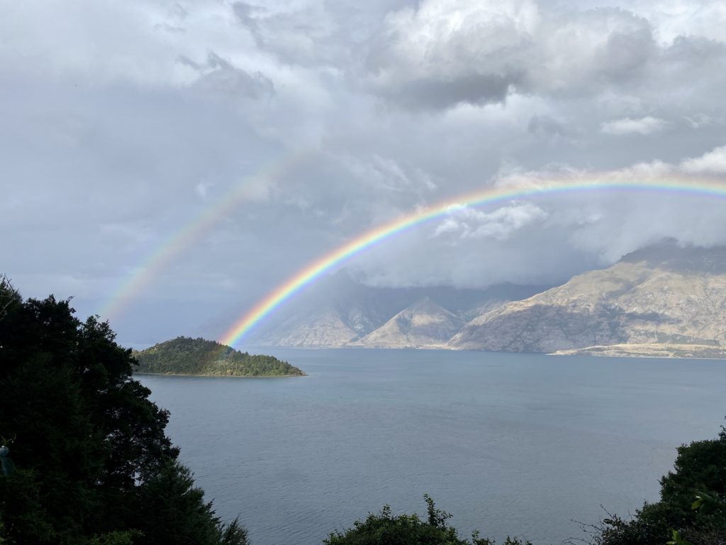 Rainbow over Pig Island, road from Queenstown, New Zealand