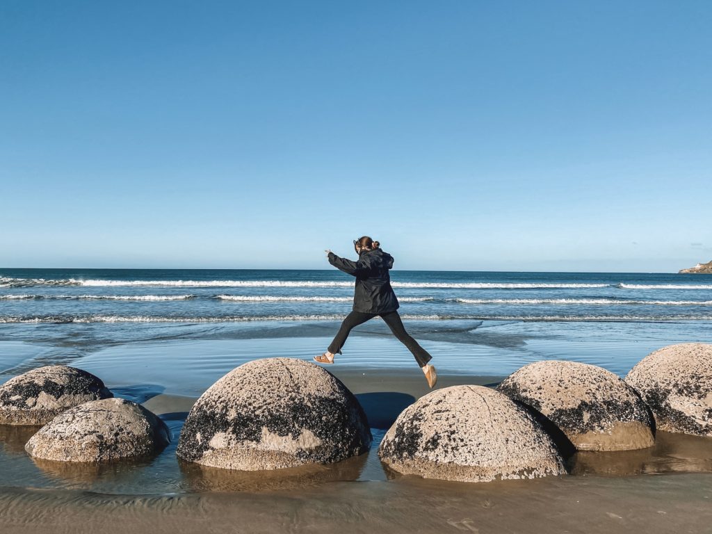 best places to visit south island: moeraki boulders outside of dunedin, new zealand