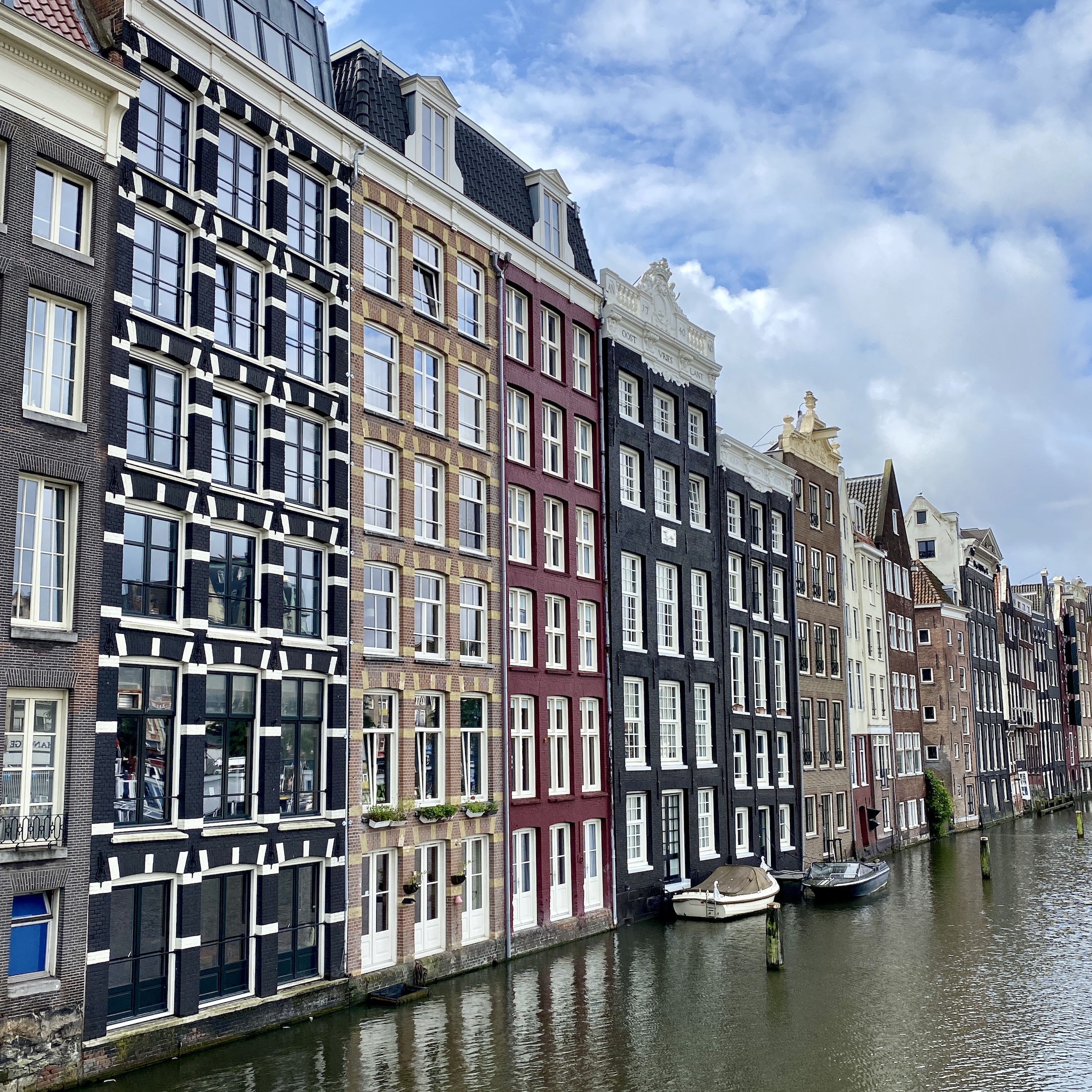 row of houses on a canal, amsterdam, the netherlands