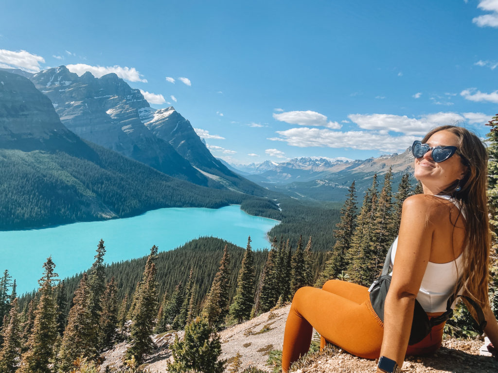 Niki sits in front of Peyto Lake, Banff National Park, Alberta, Canada