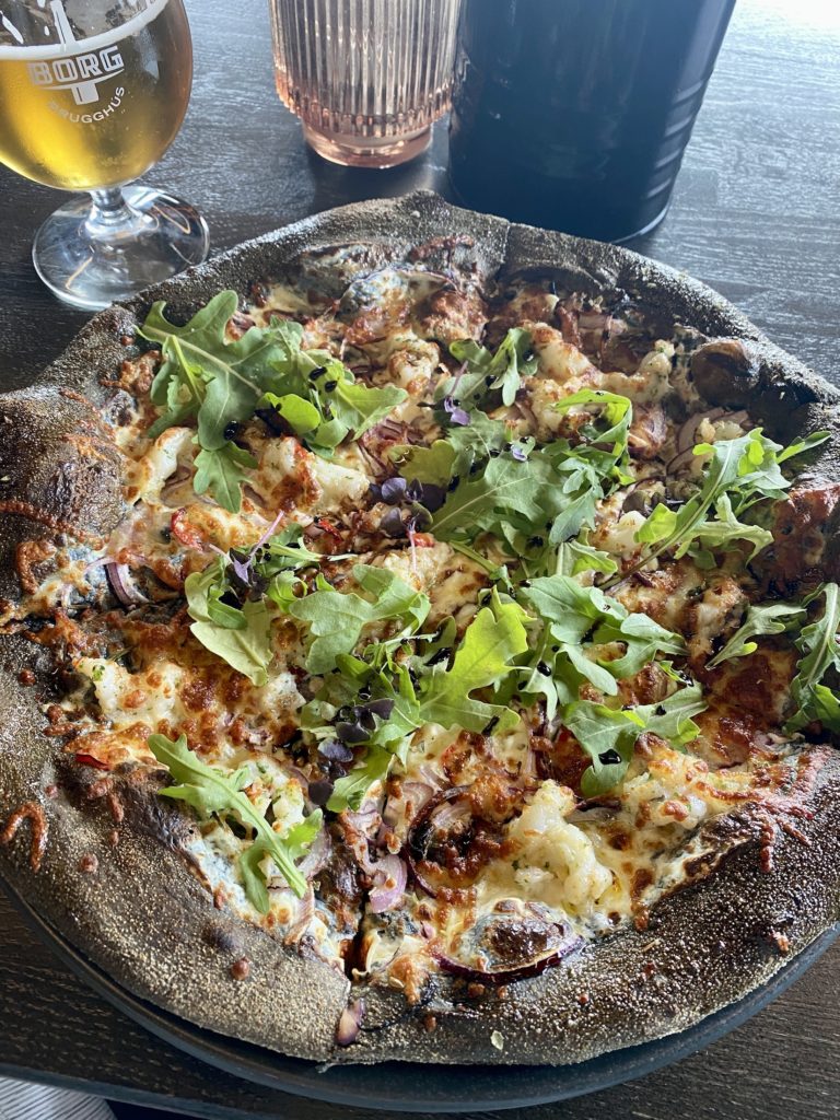 Pizza and beer at Black Crust Pizzeria, Iceland