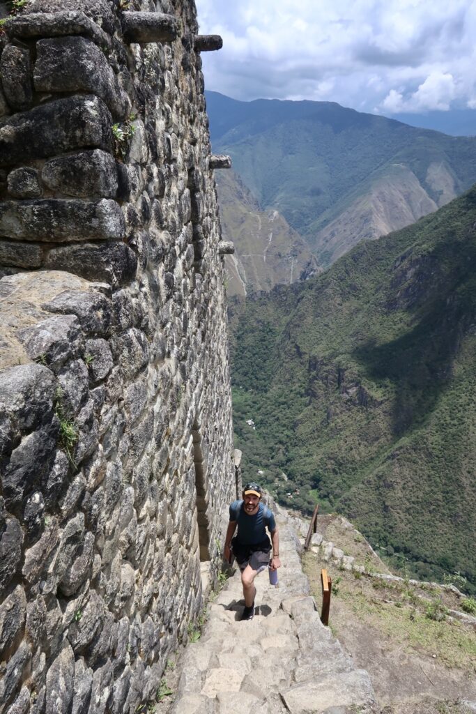 Ben climbs up Stairs of Death, Machu Picchu, Peru