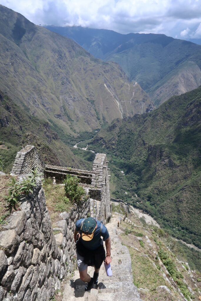 Ben hikes up Stairs of Death while hiking Huayna Picchu, Peru