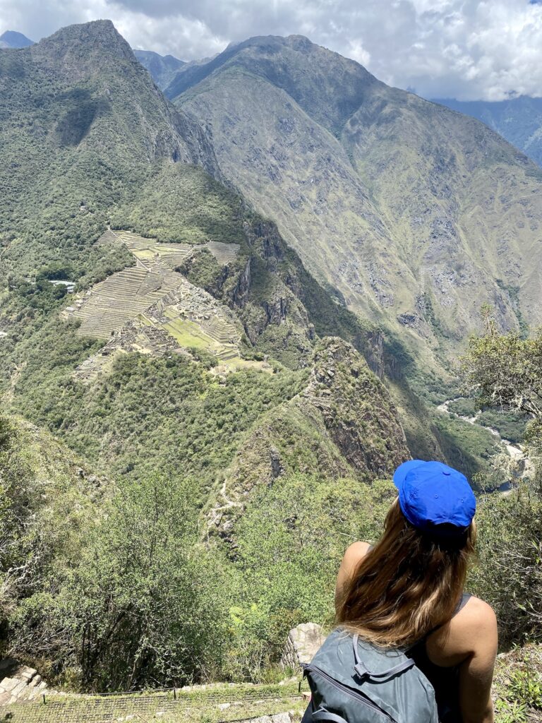 Hiking Huayna Picchu: Niki looks down at Machu Picchu and Huchuy Picchu, Peru