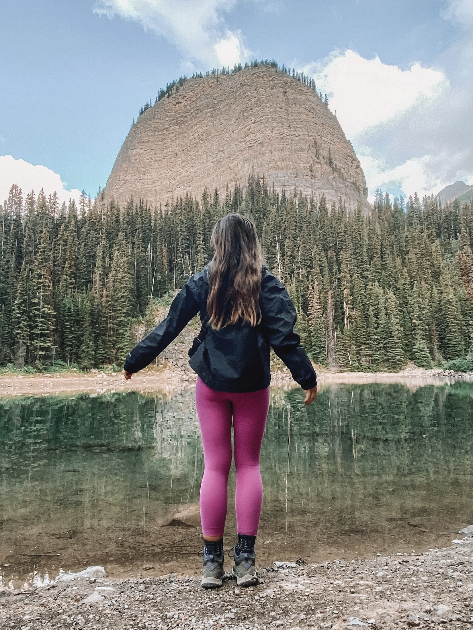 Niki stands in front of the Beehive and Lake Agnes, Lake Louise, Banff National Park, Canada