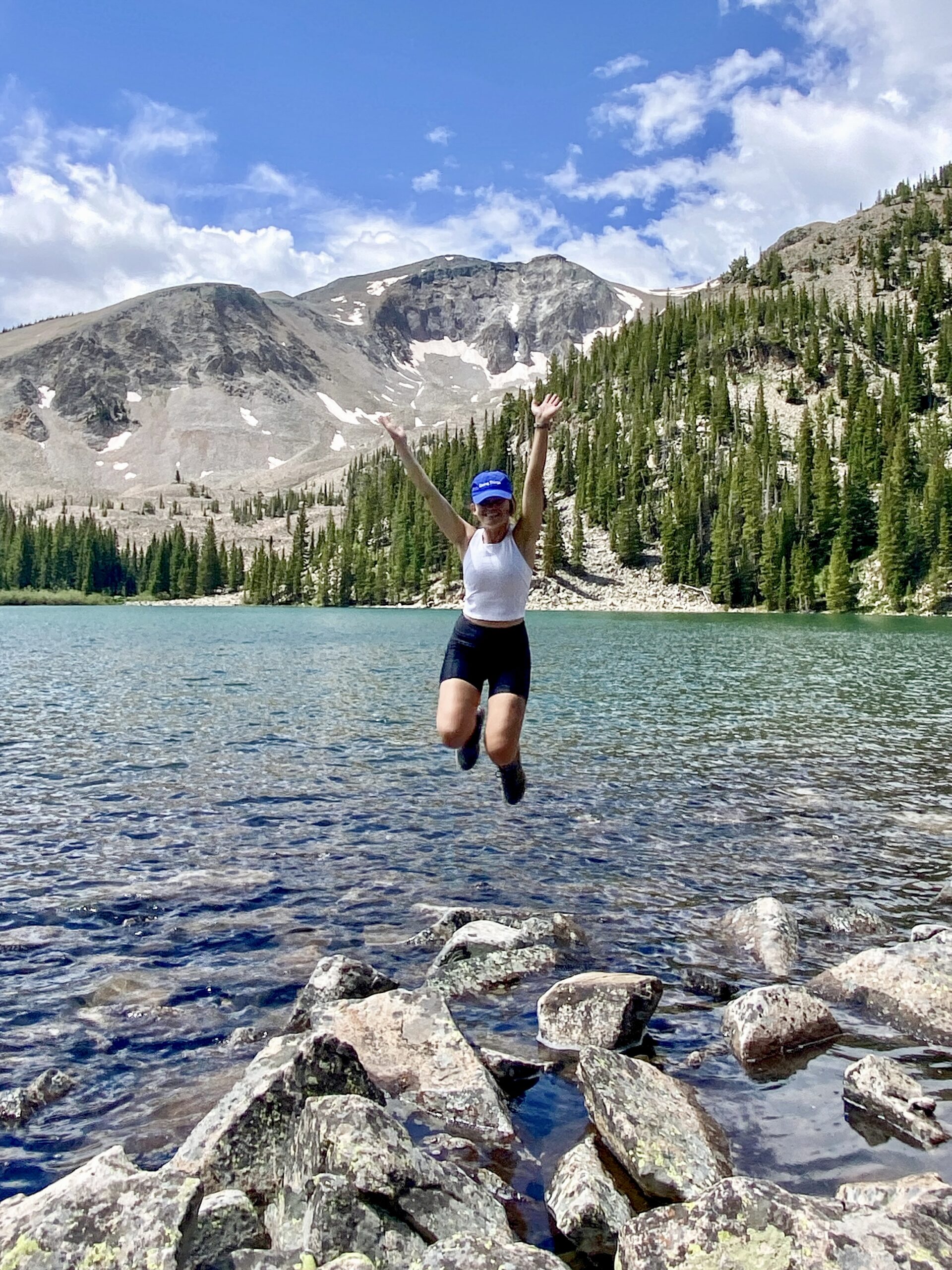 niki jumping on the thomas lakes trail hike, colorado, usa