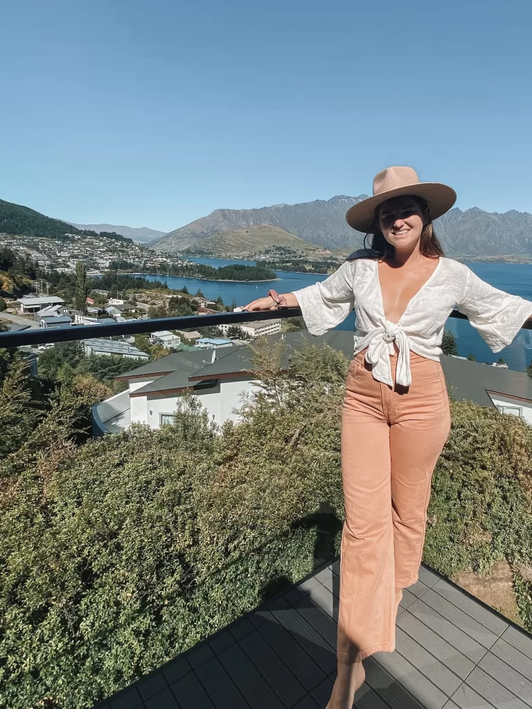 Niki stands on the balcony of her hotel room at Kamana Hotel, Queenstown, New Zealand