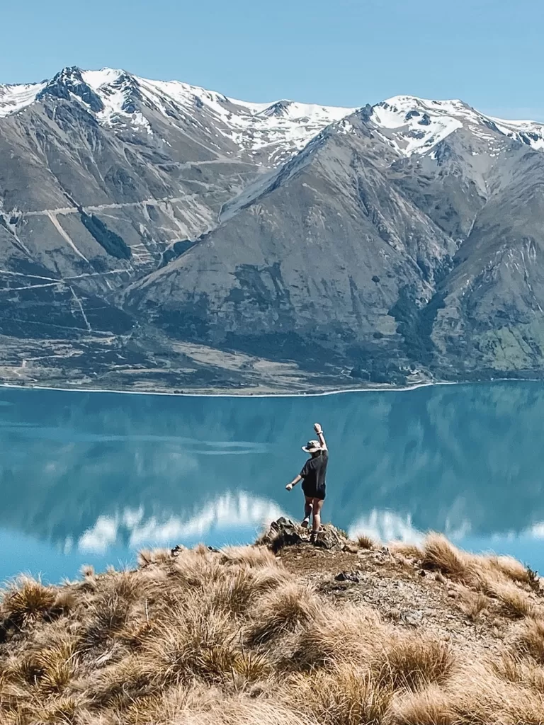 Niki hikes the Greta Track, overlooking Lake Ohau and the Southern Alps, Canterbury, New Zealand