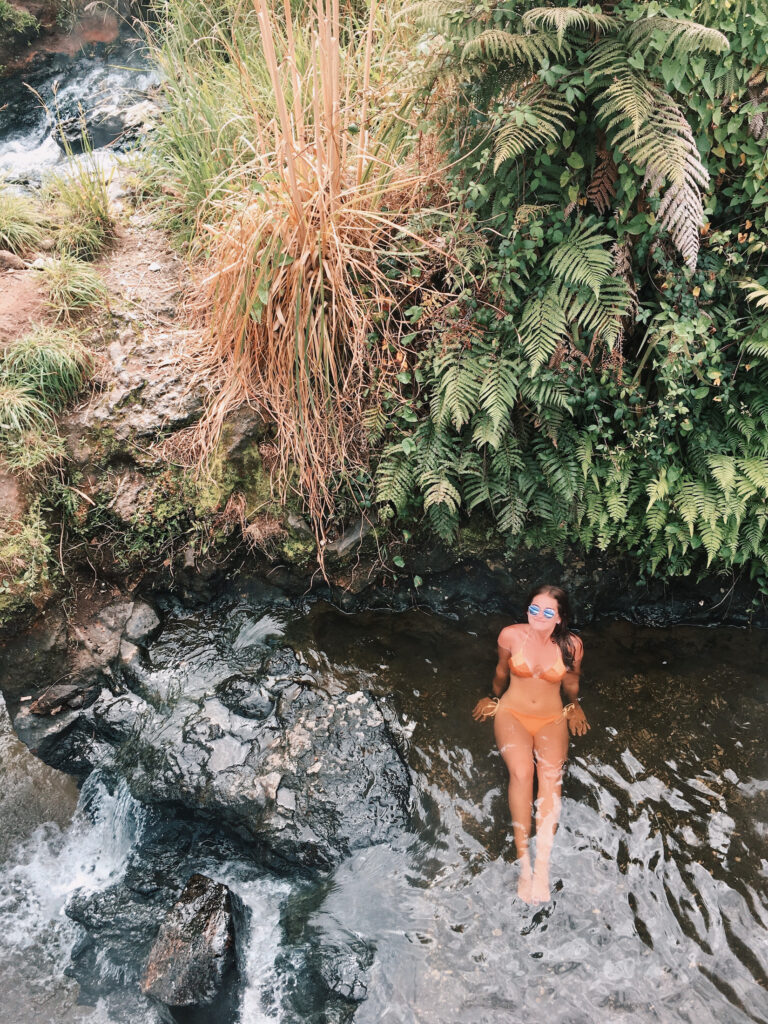 Things to do in Rotorua: Niki at Kerosene Creek, North Island New Zealand