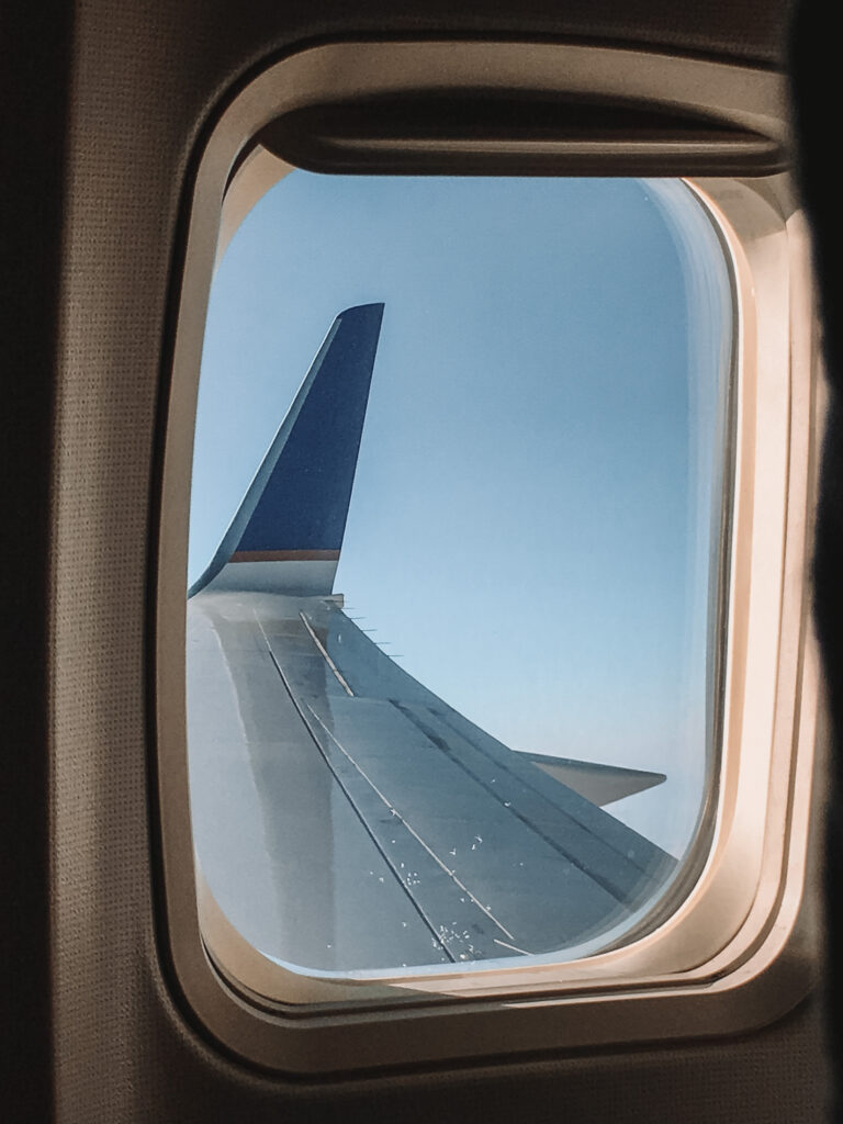Flying captions for Instagram: Airplane wing in the sky