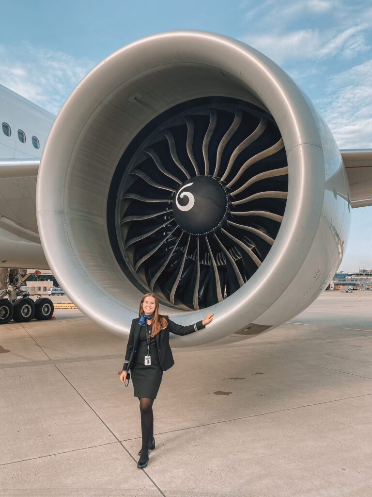 Flight attendant quotes: Niki in front of an airplane engine in Nuremberg, Germany